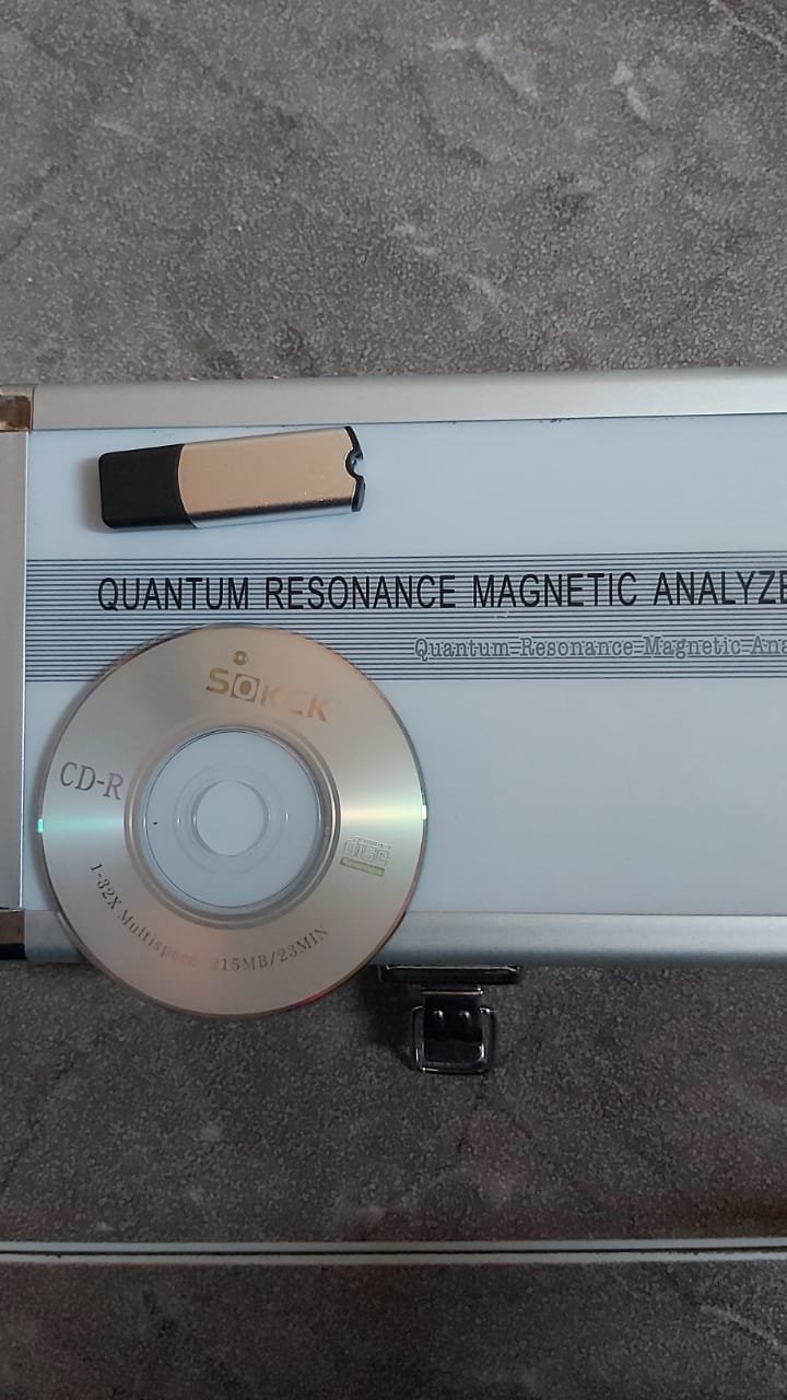 Modern clinic with quantum scanner device on medical desk