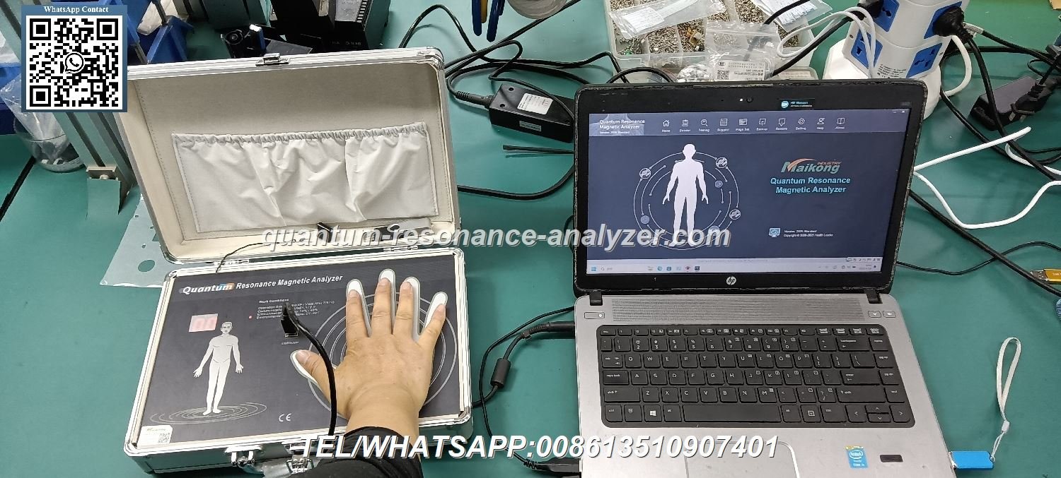QRMA Machine handheld sensor and computer interface showing health analysis